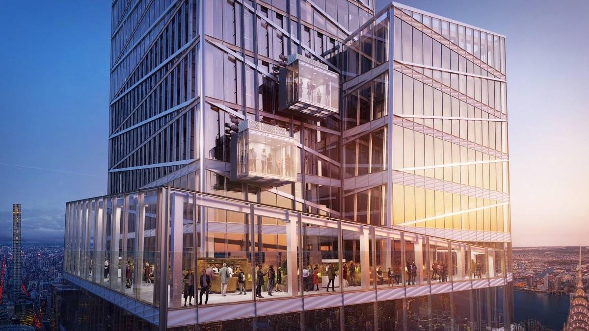View of Summit One Vanderbilt observation areas with the sun shining on the building at dusk
